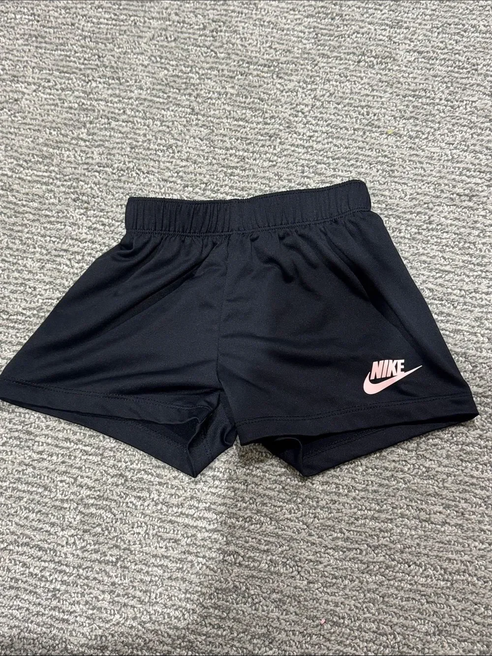 Nike Black Athletic Shorts with Pink Swoosh